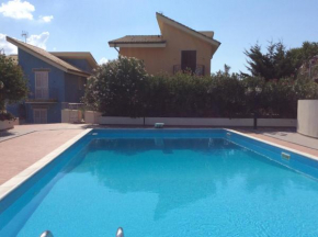 Отель Nuovo Apt in Villa full optional con piscina e veranda vista mare a 500 mt dalla spiaggia della Scala, Реалмонте